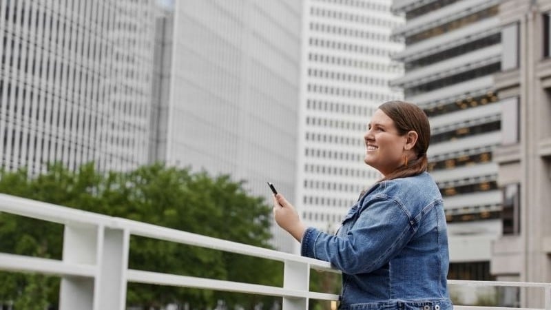 woman holding mobile