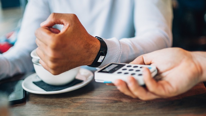 watch payment in coffee shop